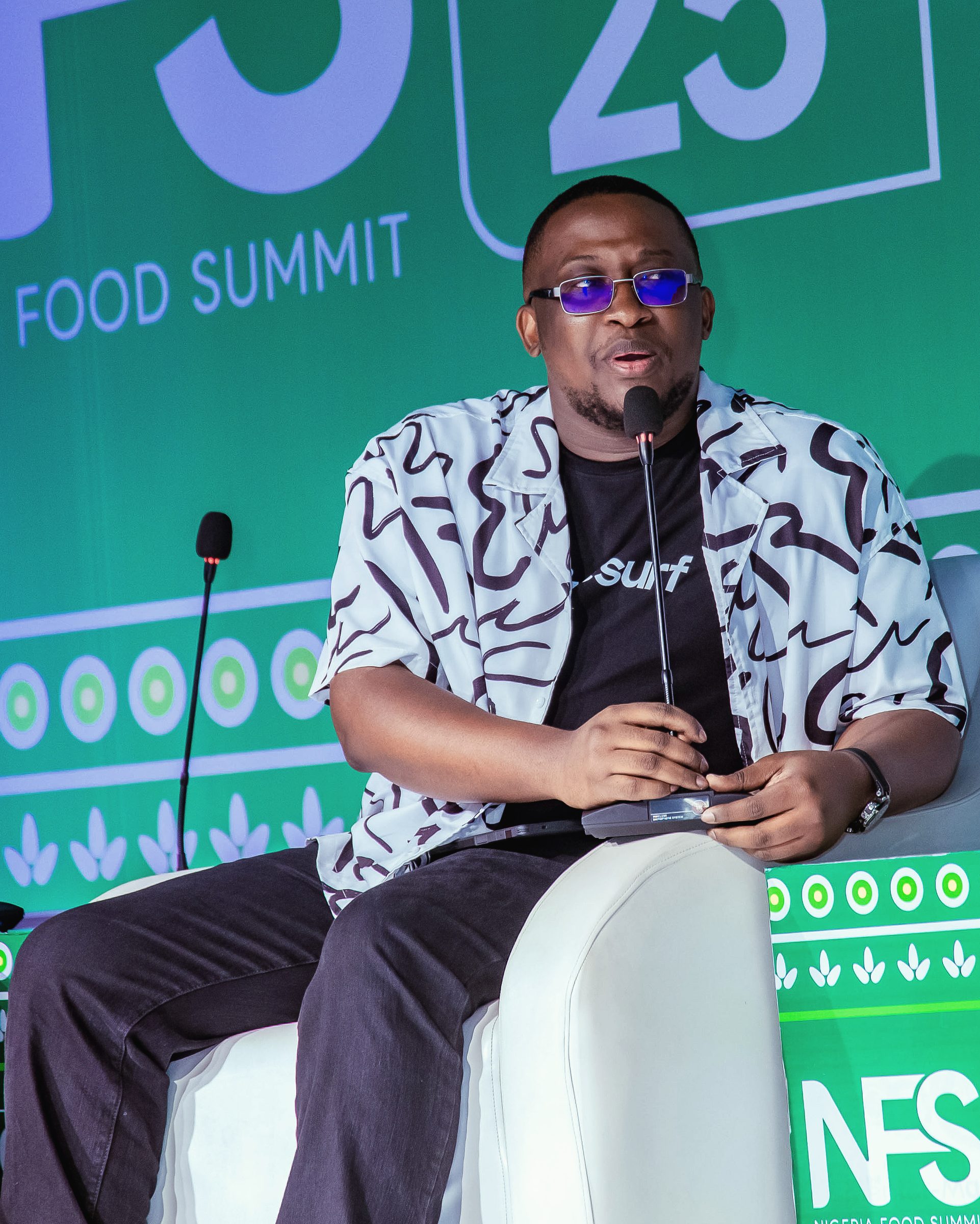Joshua speaking on stage at Nigeria Food Summit 2025