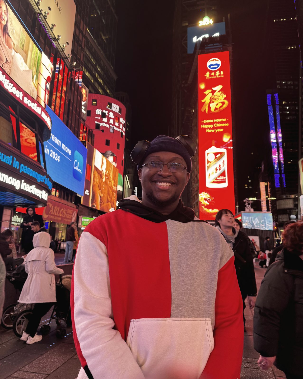 Joshua in Times Square at night